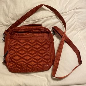 Lug Ranger bag in rosewood. The interior is maples cream.